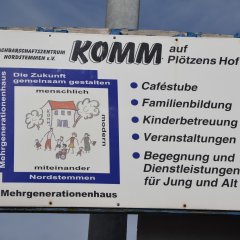 Schild KOMM